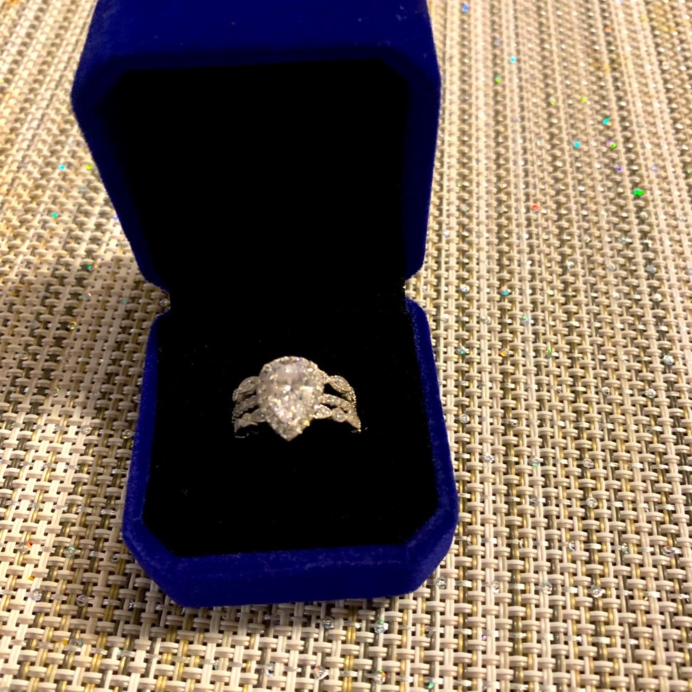 Wedding band- never worn. Too small. Lab created diamond